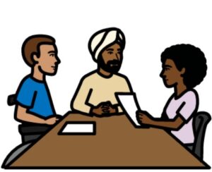 3 people at a meeting. A lady is reading from a piece of paper. She is running the group.