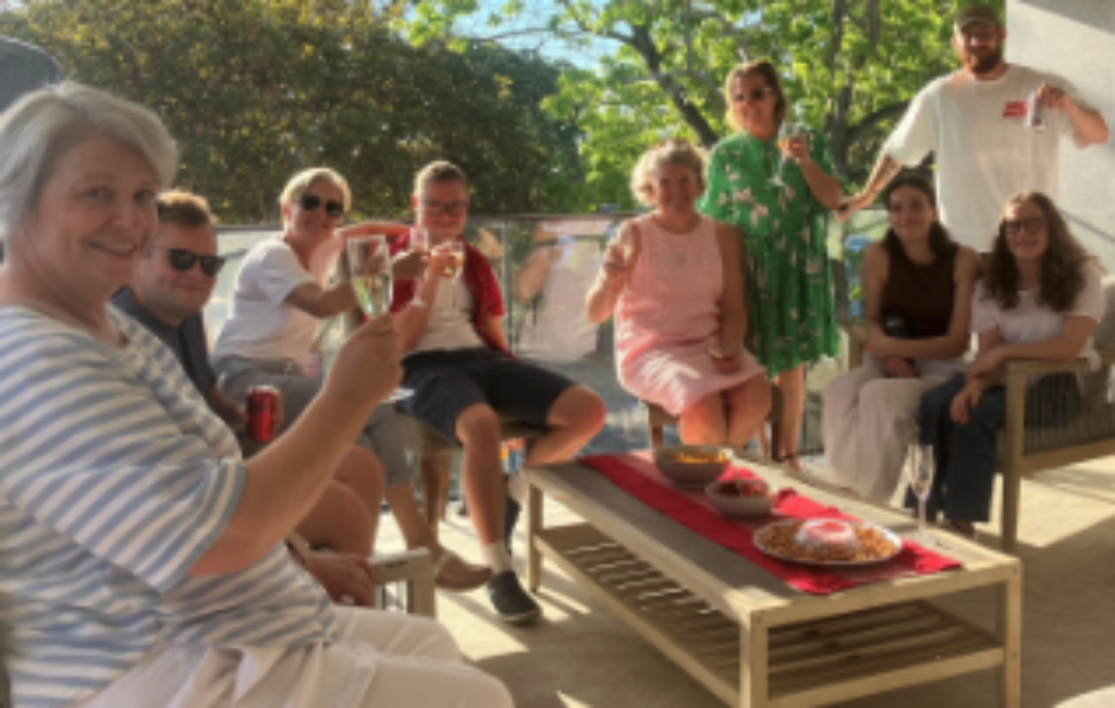 Community Living Project Circle of Support. A group of people enjoying a drink together on a patio