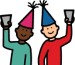 Two people wearing party hats and holding drinks celebrating