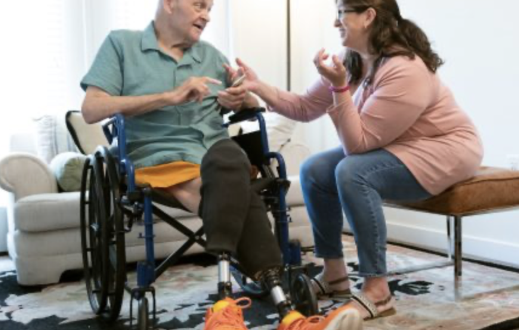 Amputee talking to a friend. Limbs 4 Life
