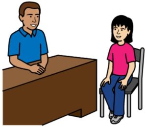 Man at desk with young woman